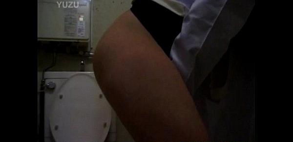  Yuko Tachibana uses vibrator on pussy on WC